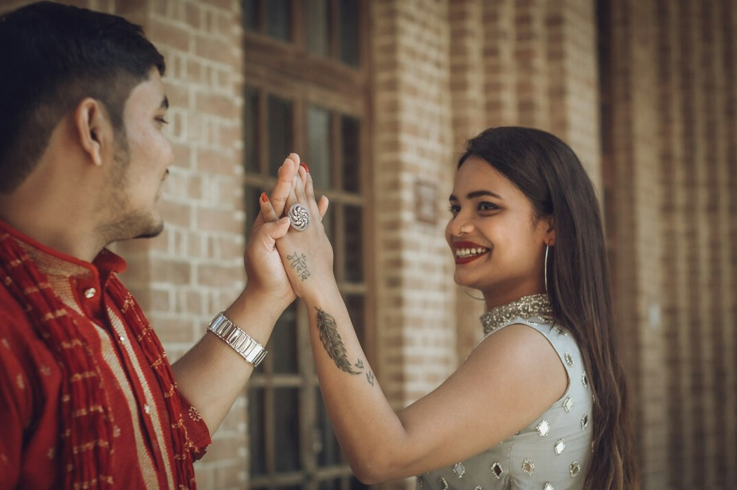 Two colleagues shaking hands in an office